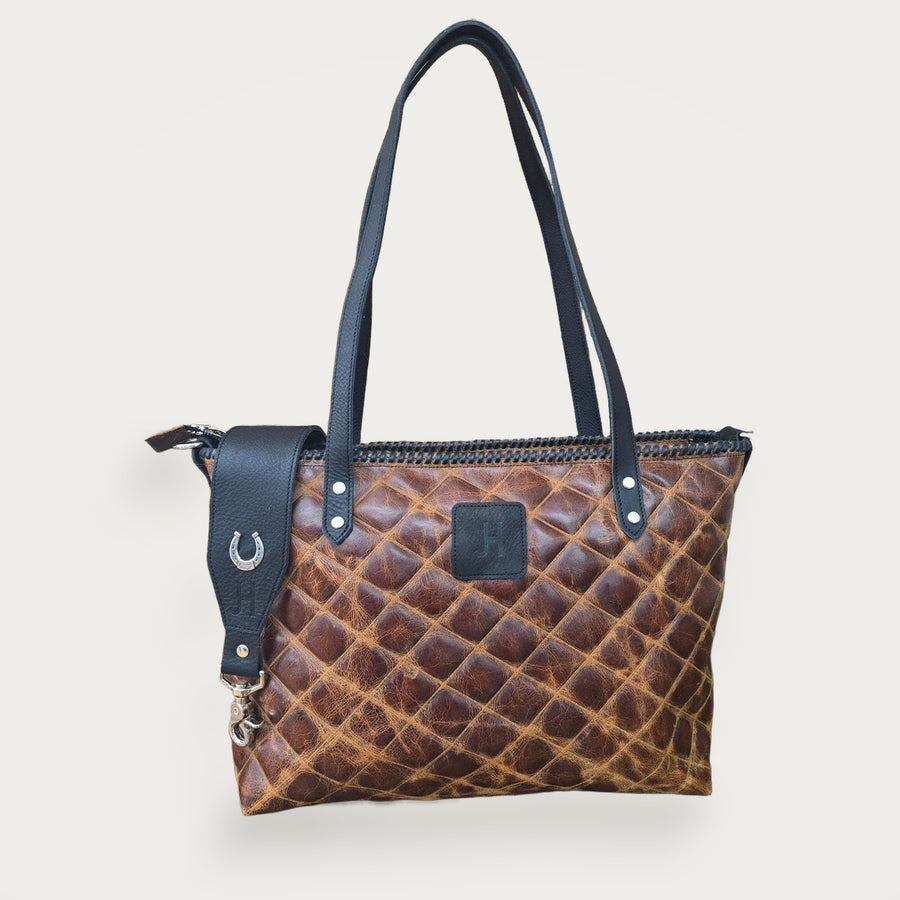 The Daisy - Quilted Caramel on approved studio background — Jill's Homestead — Creative OS 20260810
