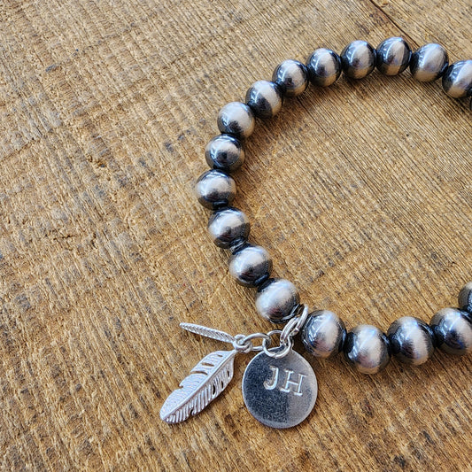 Navajo Pearl Silver & Feather Charm Bracelet