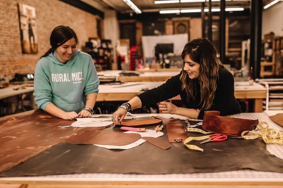Women artisans working with leather in the Jill’s Homestead workshop